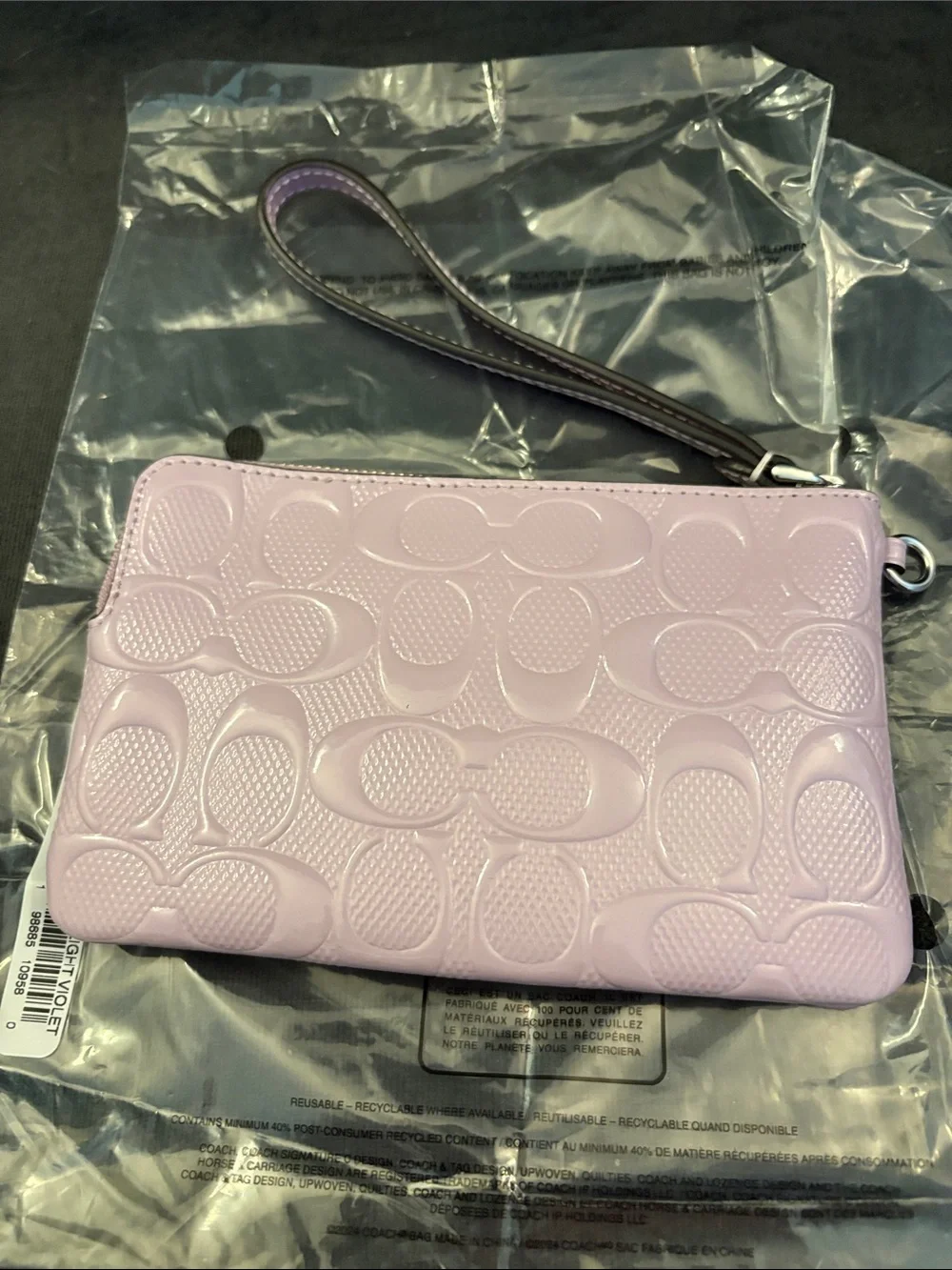 COACH Light Lilac Embossed Signature Wristlet
